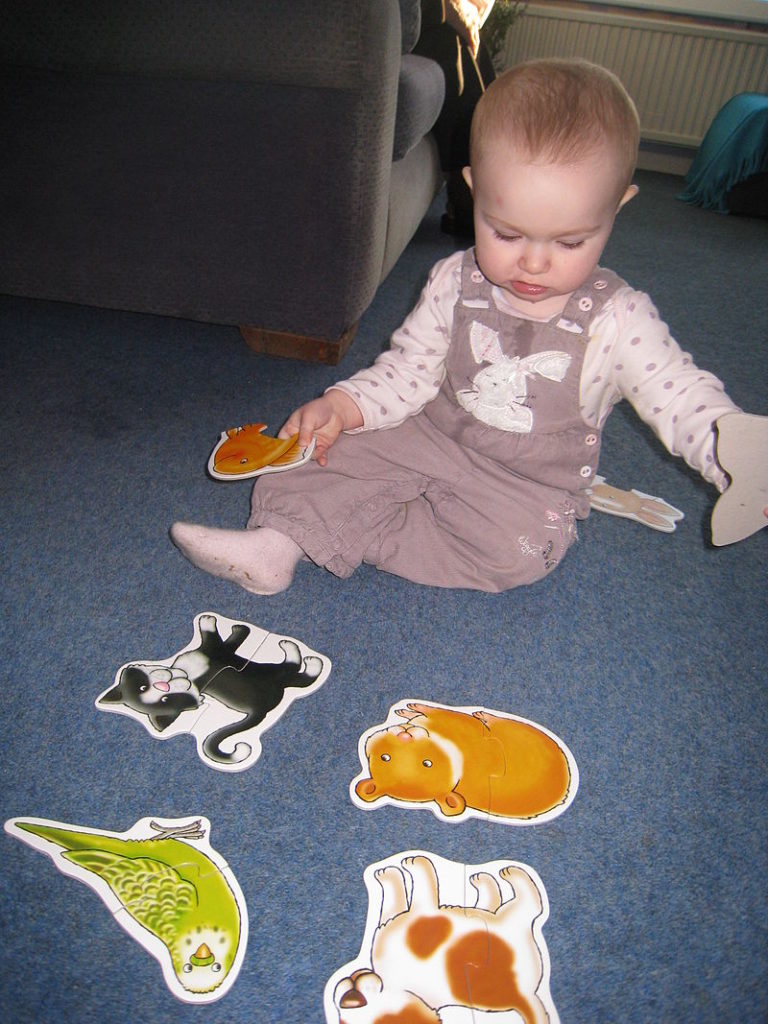 Baby_doing_Jigsaw_Puzzles